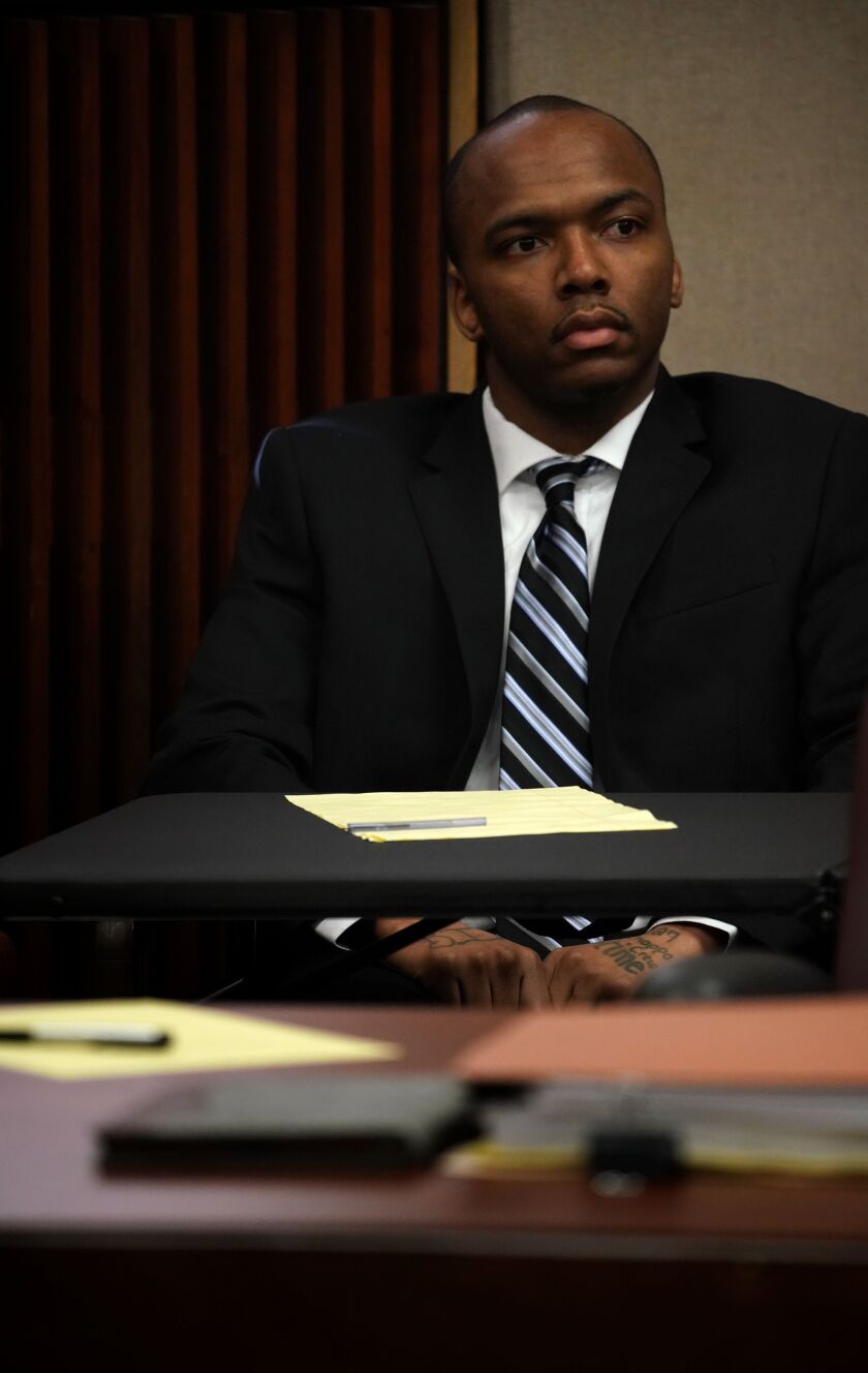 Dwright Boone-Doty appears during opening statements in his trial for the murder of 9-year-old Tyshawn Lee at the Leighton Criminal Court building in Chicago on Tuesday, Sept. 17, 2019.